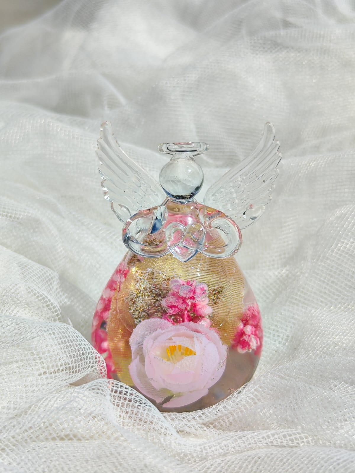 Ángel de los Deseos con rosas