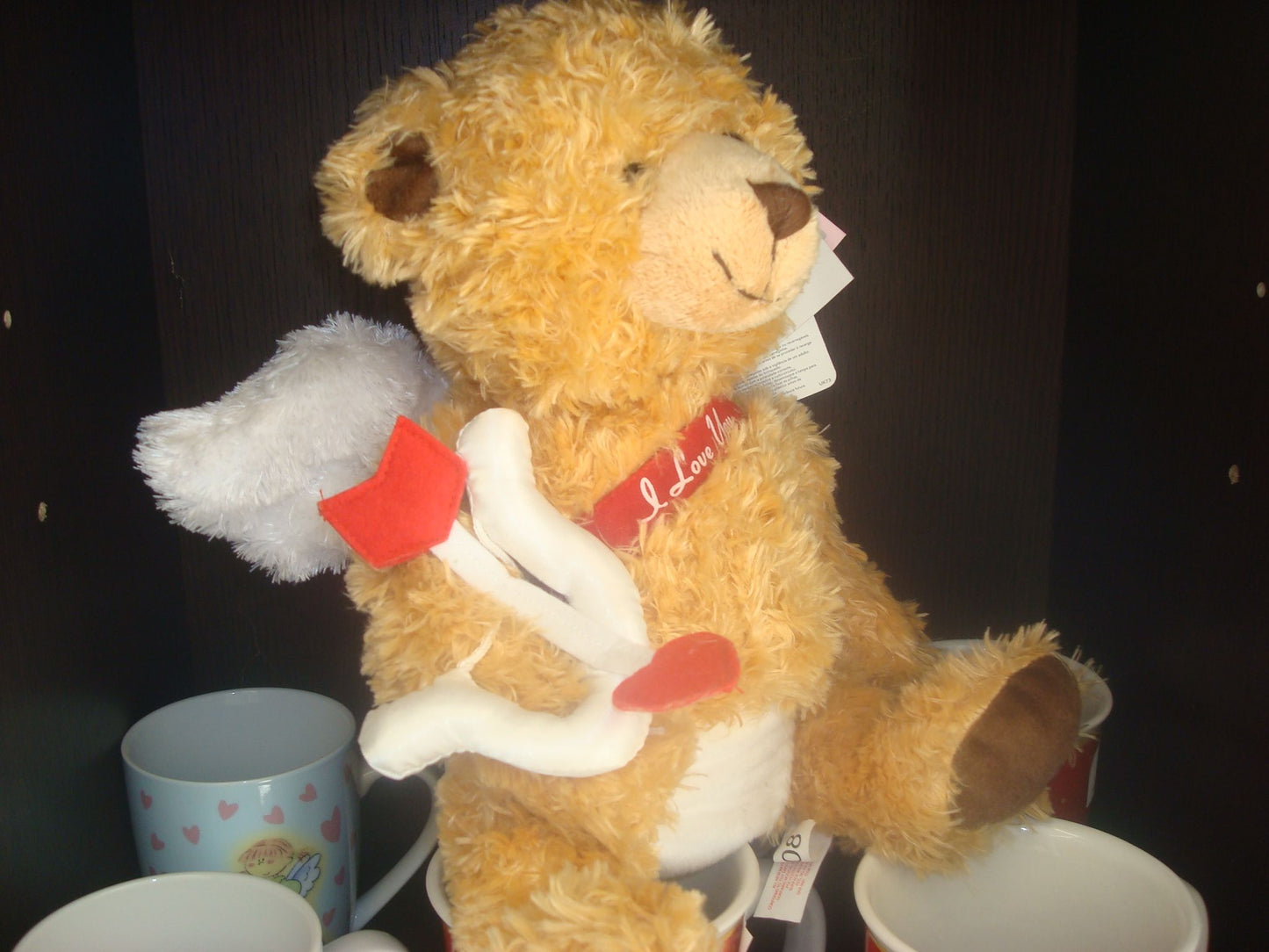 Cupido en osito de peluche musical