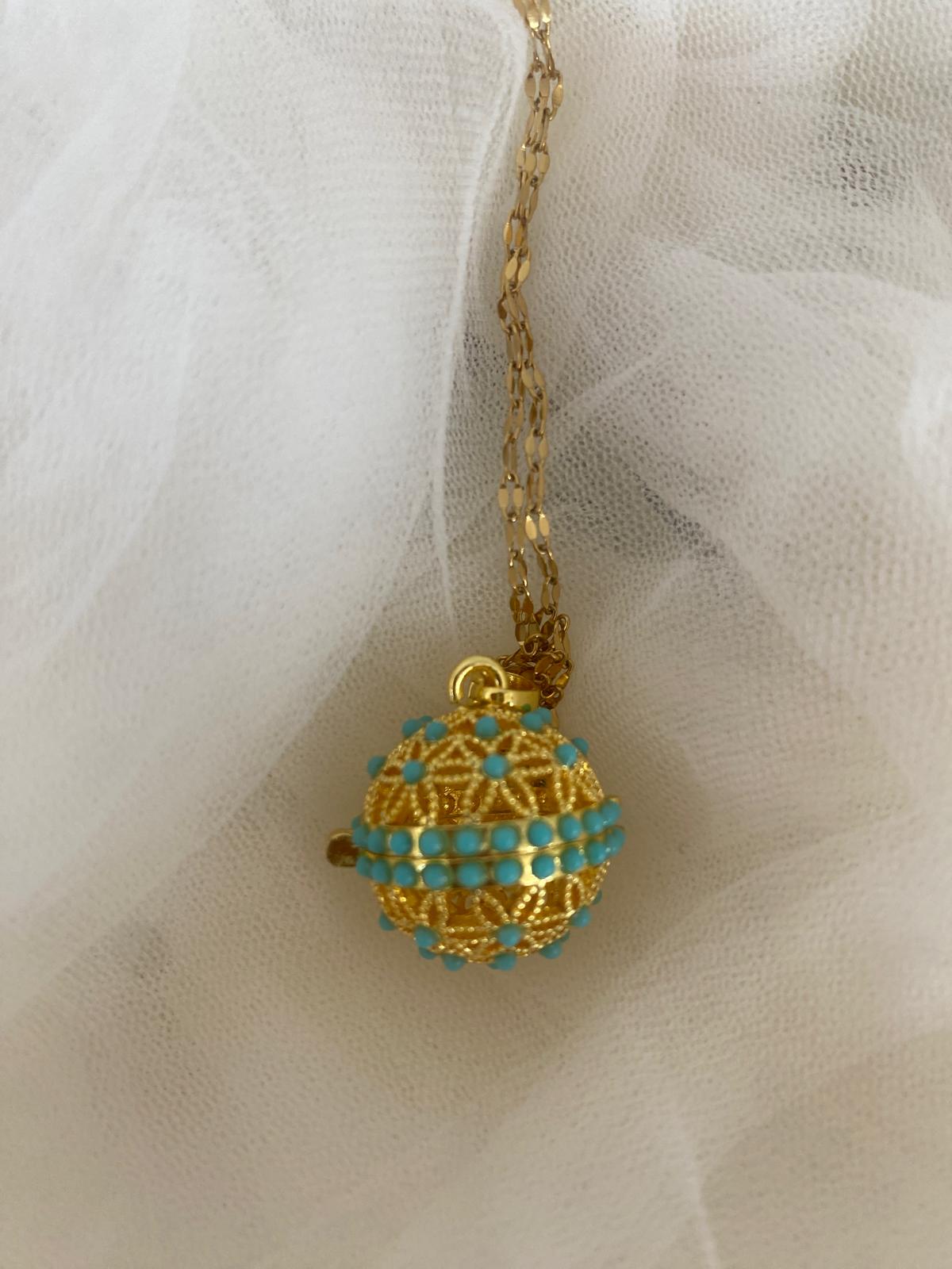 Llamador de Ángeles dorado decorado turquesa